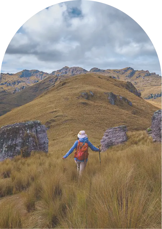 woman hiking on foothills